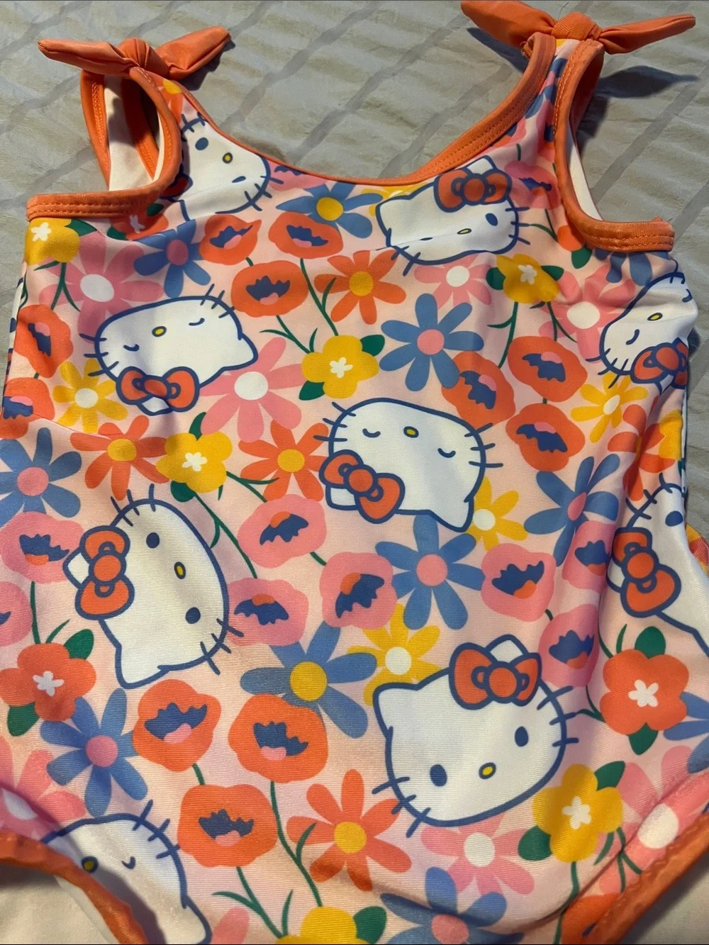 Hello Kitty Multicolor Floral Swimsuit - Pink Base with Orange Trim